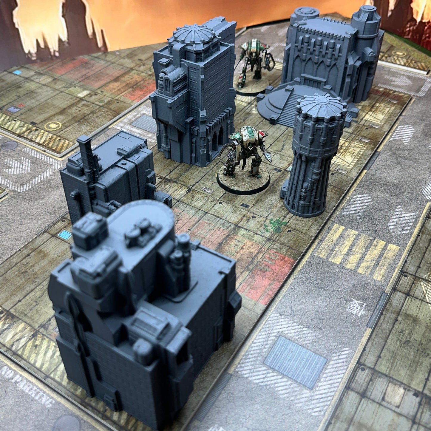 Board game setup with futuristic cityscapes and characters on a detailed map